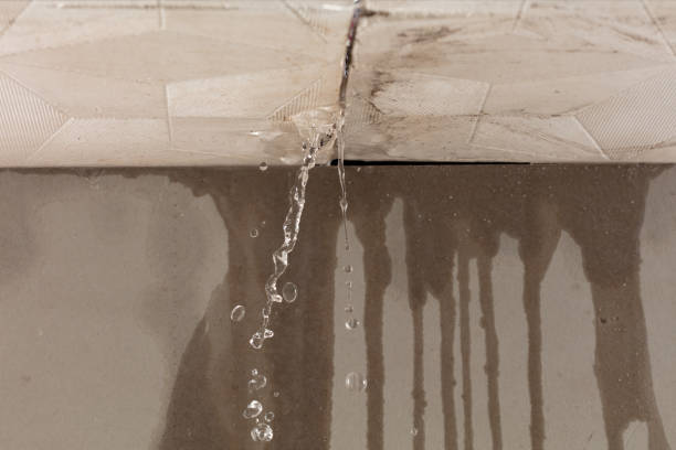 Professional Flood Damage Cleanup technician working in Coshocton, OH